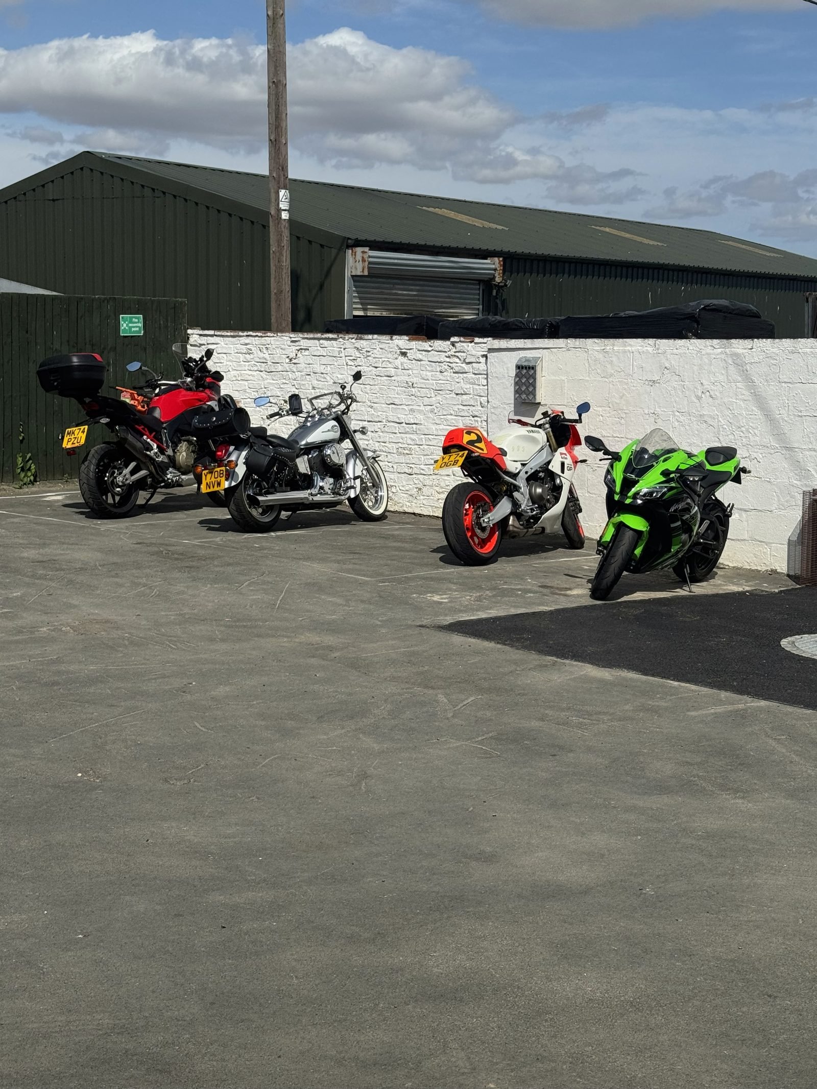 Sports bikes parked up at the café